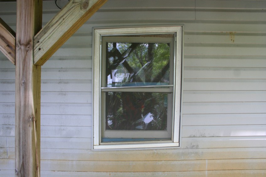 Window View of House Movement